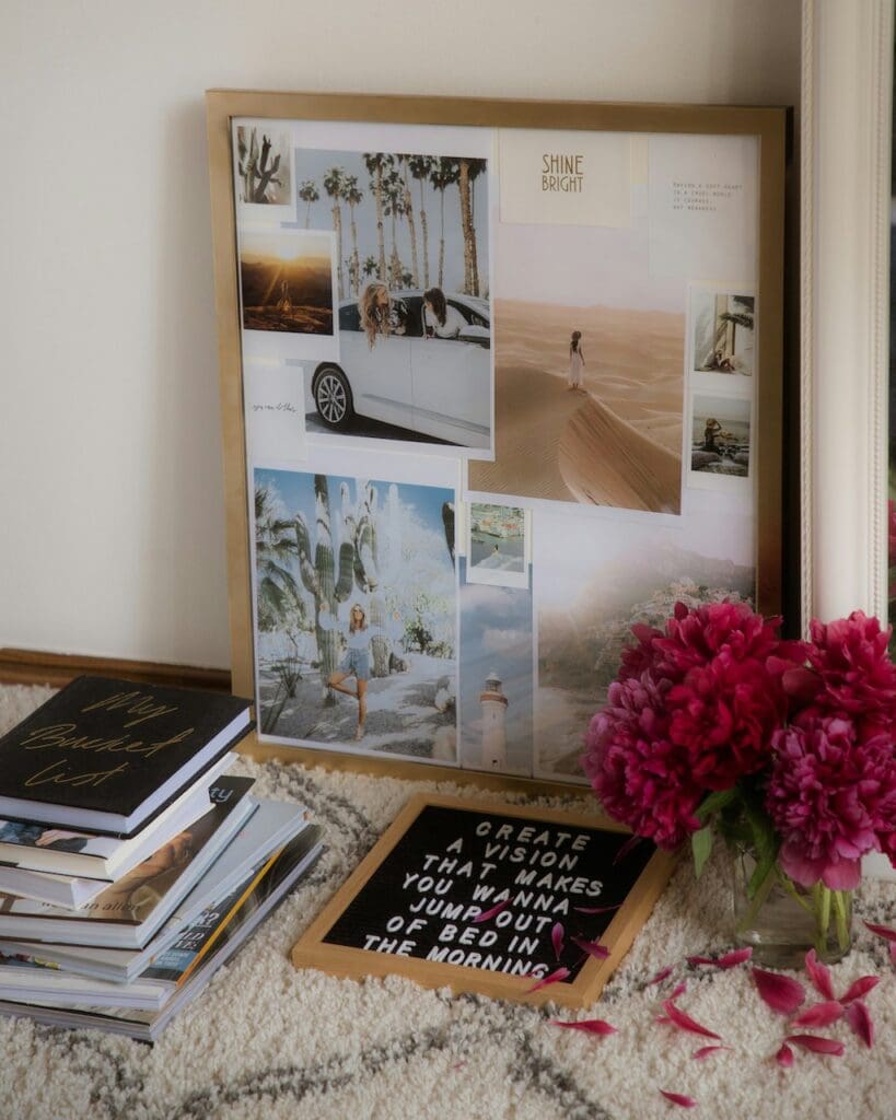 Mood board next to vase of peonies