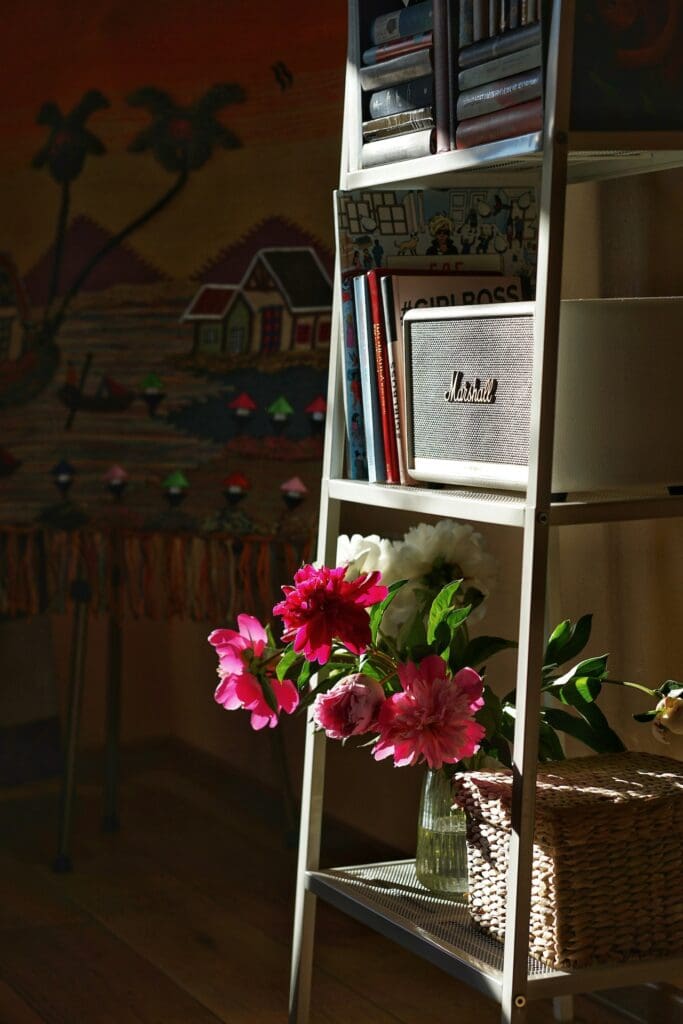 Peonies on shelf